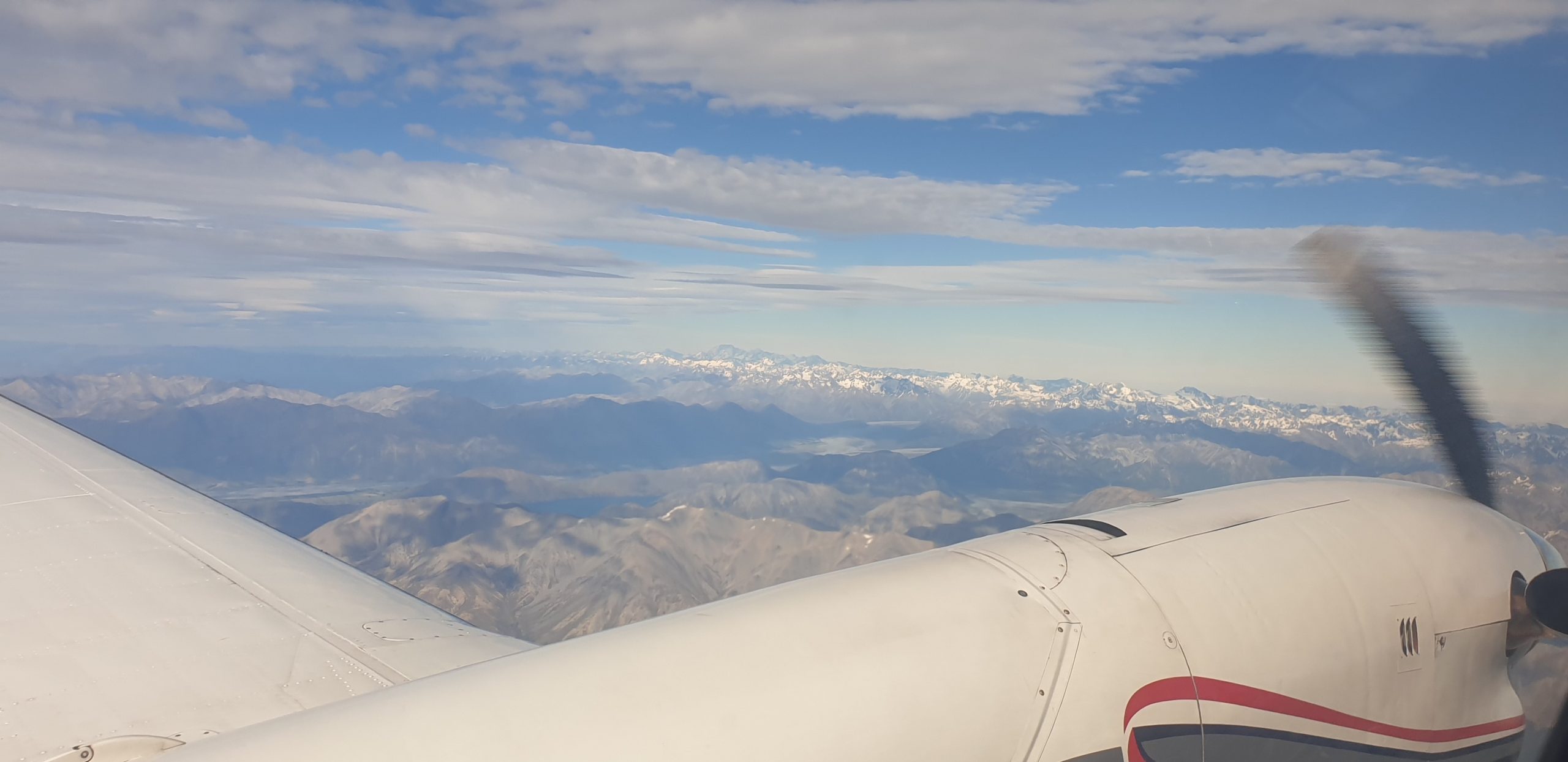NZFD plane in flight mountain view
